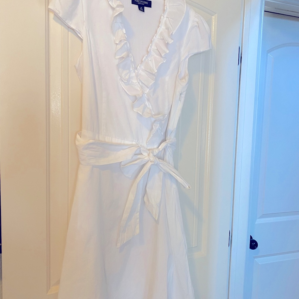 Large white cotton ruffled neck dress